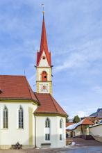 View of the sacristy with old church tower
